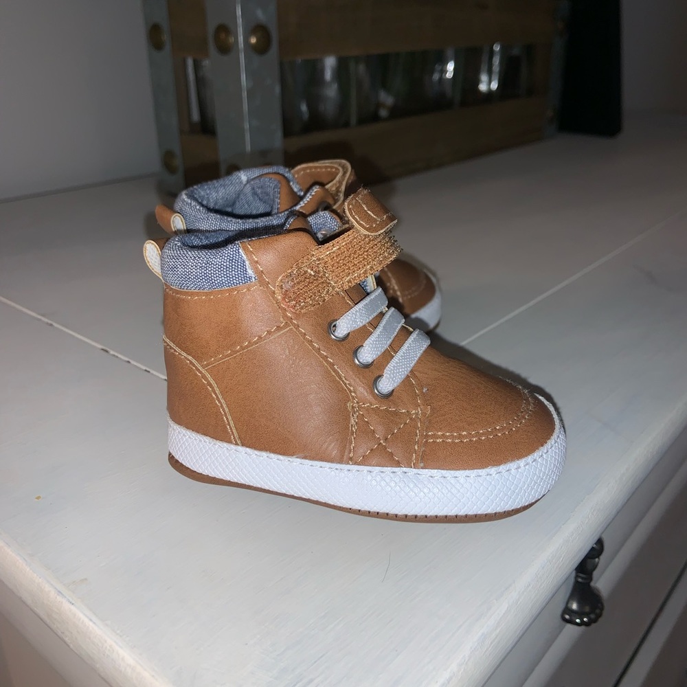 Walking shoes , brown boots never worn